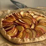 An open topped Apple Tart with a shortcrust pastry base.