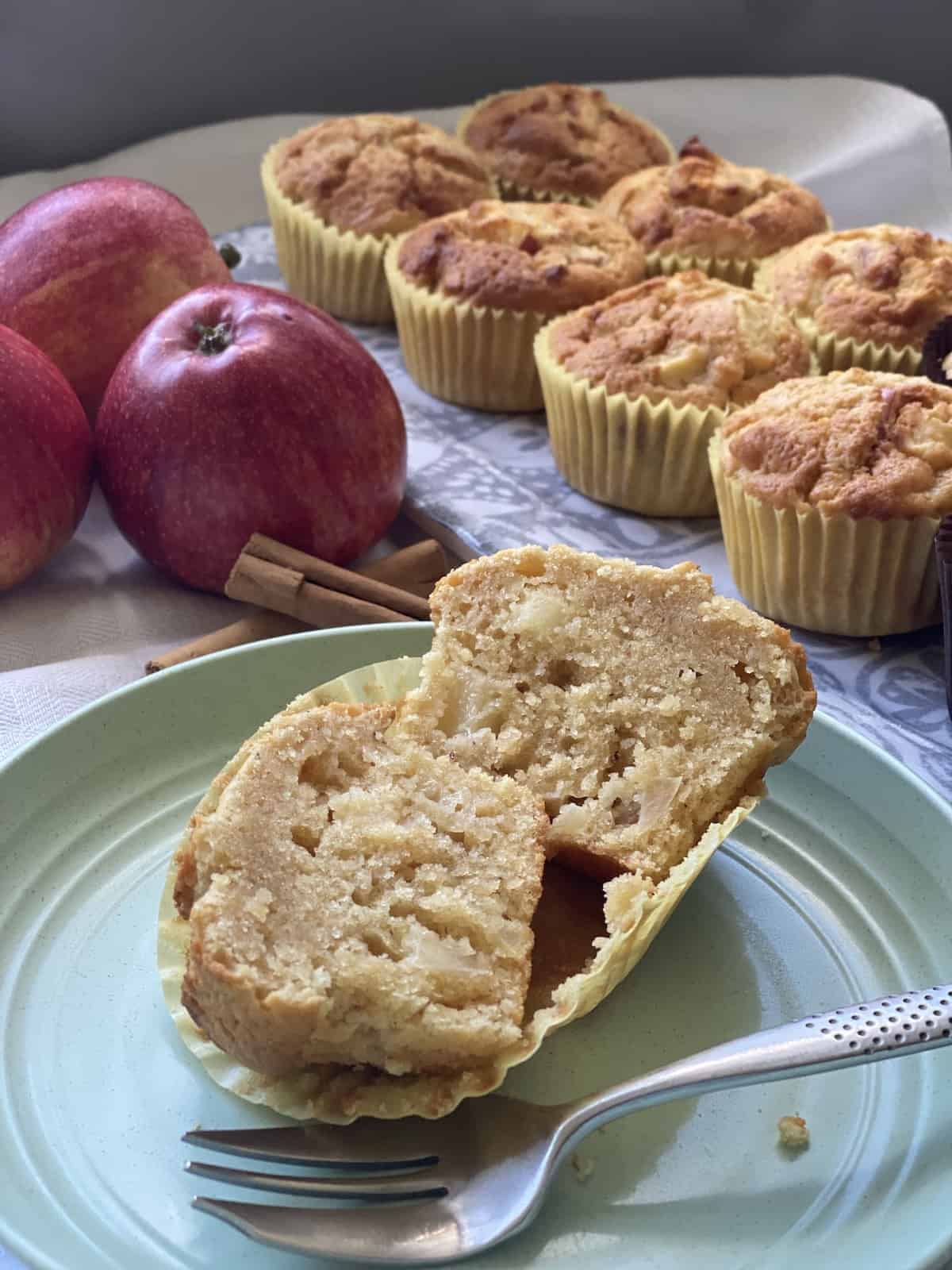 Sliced Apple and Cinnamon Muffin on a plate.