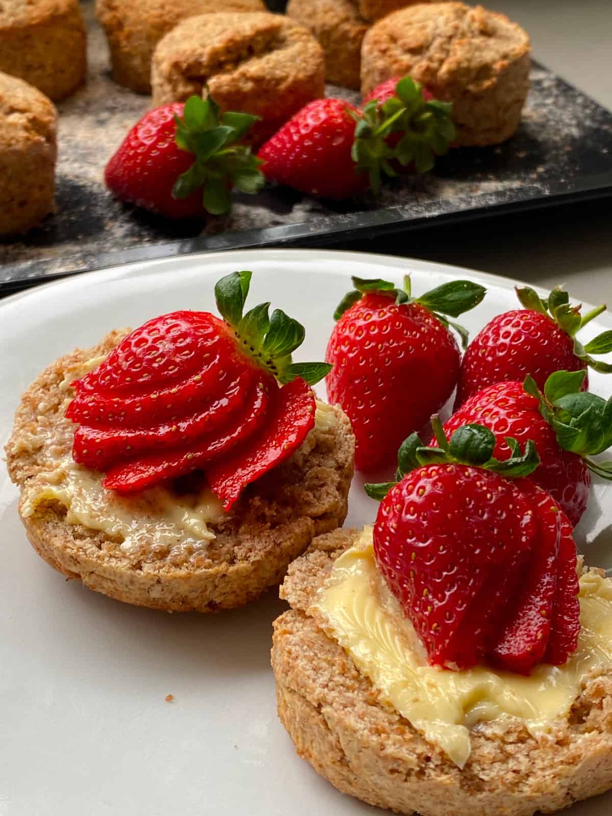 Rye Scones with butter & strawberries.
