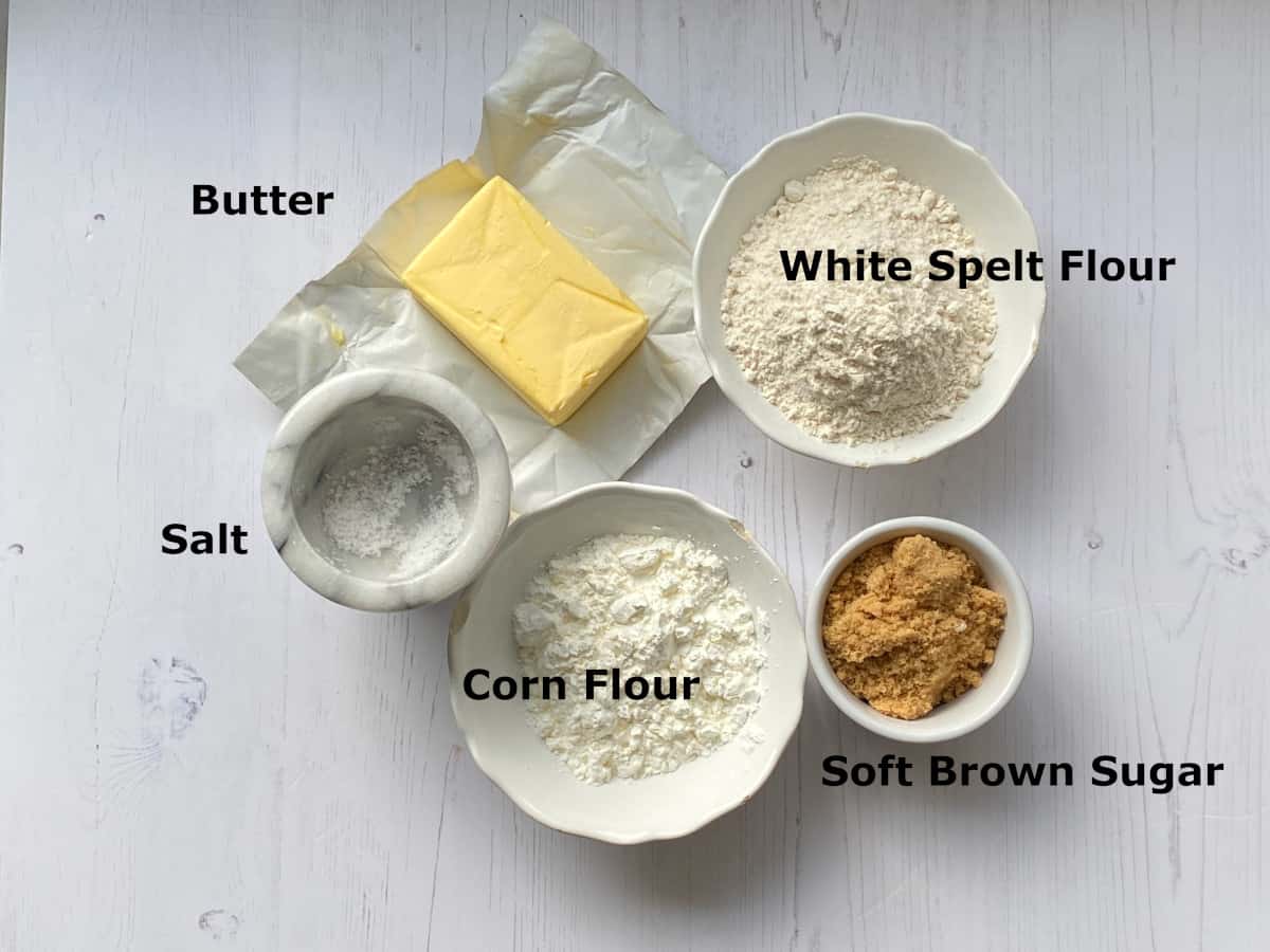 Overhead shot of ingredients in individual white bowls.