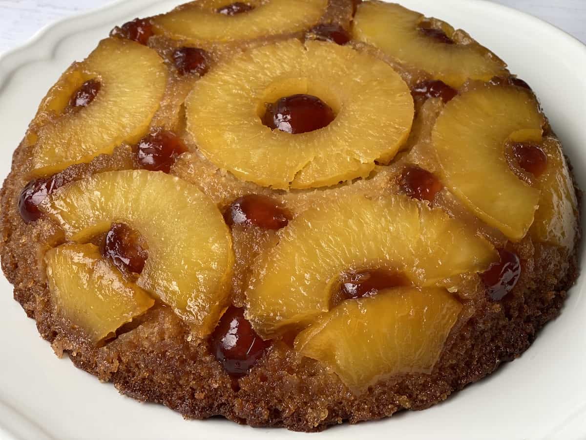 Pineapple Upside Down Cake on a white plate.