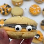 Close up of a hand held halloween Monster Cookie.