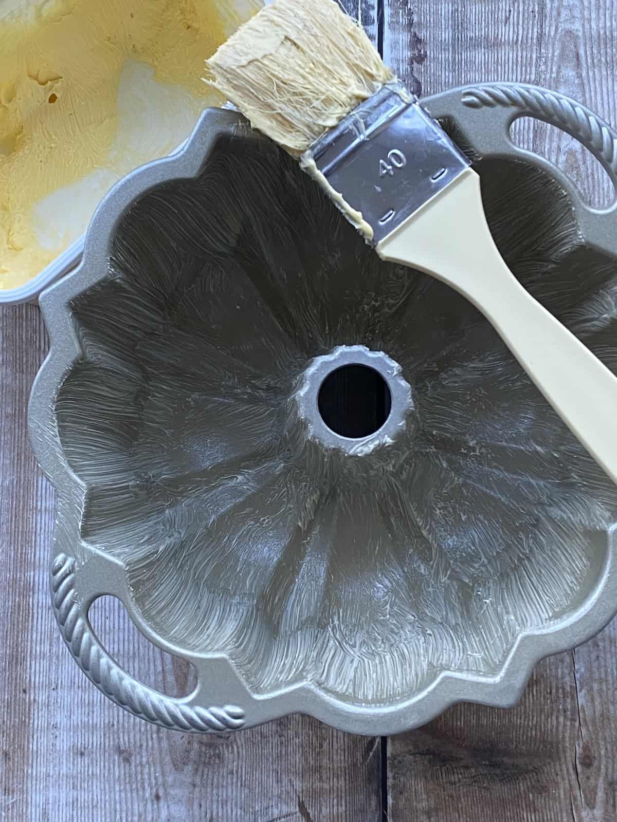 Coat the inside of the Bundt Pan with softened Butter.