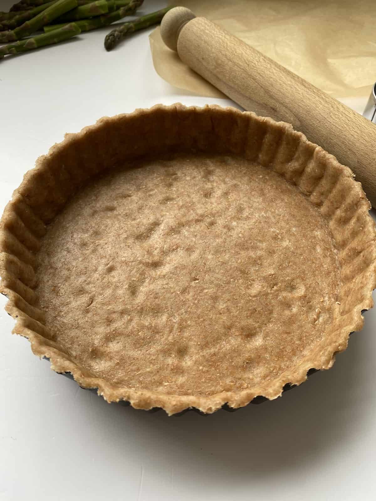 Tart Pan lined with Shortcrust Pastry.