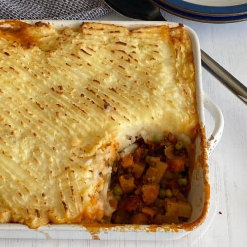 Vegetable and Lentil Cottage Pie with a portion taken out.
